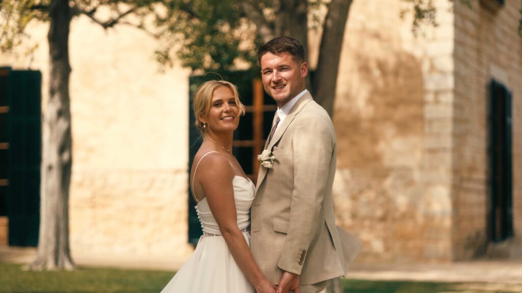 Wondering when the UK wedding season is? A couple enjoy the sunshine one their wedding day.