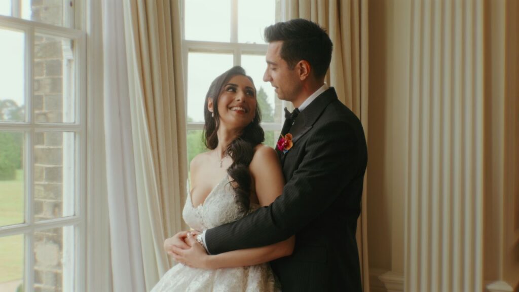 A couple on their wedding day share an intimate moment together. This couple get to relive these moments forever as they booked an affordable wedding film package. 